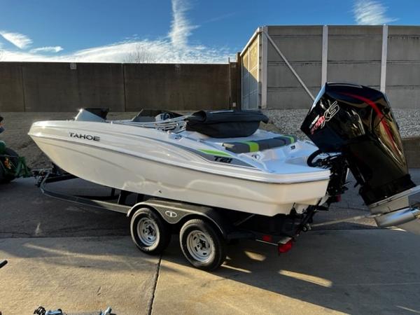 Tahoe T21 2024 Tahoe T21 boat on trailer with outboard motor.