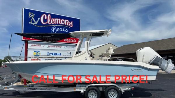 Boston Whaler 250 Dauntless 2024 Boston Whaler 250 Dauntless boat on trailer at Clemons Boats dealership.