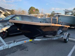 Rabco 16' Bucaneer 2022 Rabco 16' Bucaneer boat on LoadRite trailer in parking lot.
