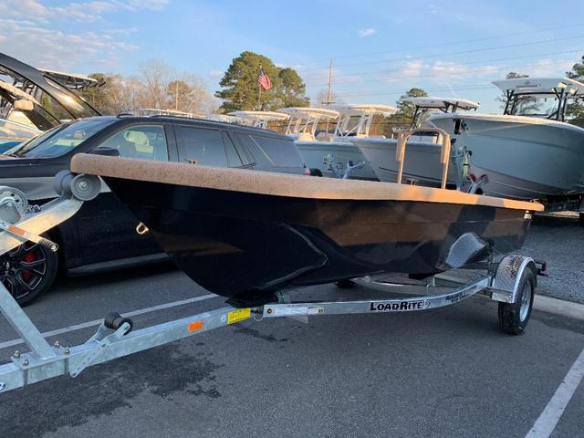 Rabco 16' Bucaneer 2022 Rabco 16' Bucaneer boat on LoadRite trailer in parking lot.