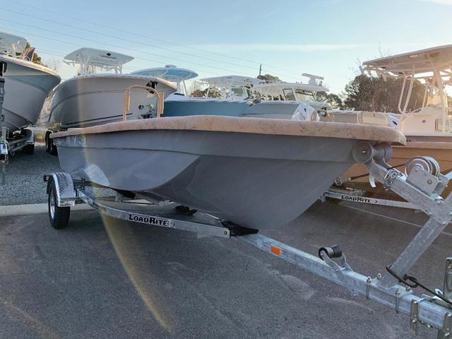 Rabco 16' Bucaneer 2022 Rabco 16' Bucaneer boat on LoadRite trailer in a marina.