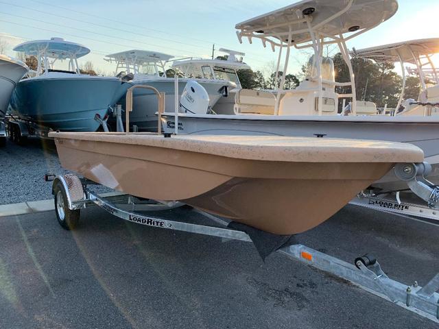 Rabco 16' Bucaneer 2022 Rabco 16' Bucaneer boat on Load Rite trailer in a marina.