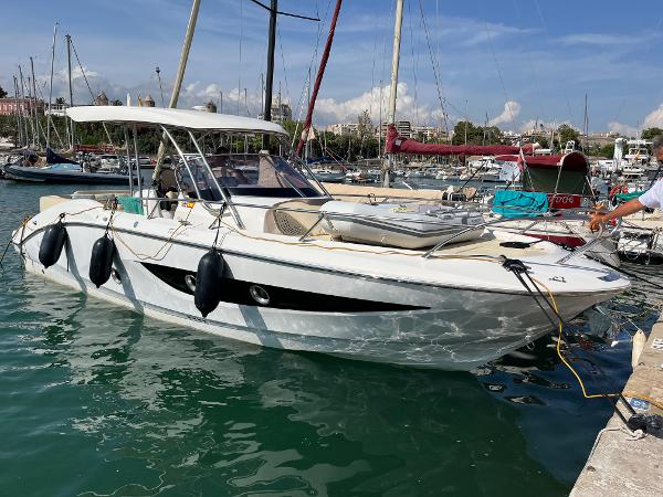 Sessa Marine Key Largo 34 2012 Sessa Marine Key Largo 34 boat docked in a marina, sunny day.