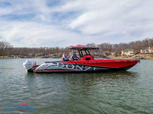 Donzi 39 VRZ 2024 Donzi 39 VRZ boat on a lake with scenic background.