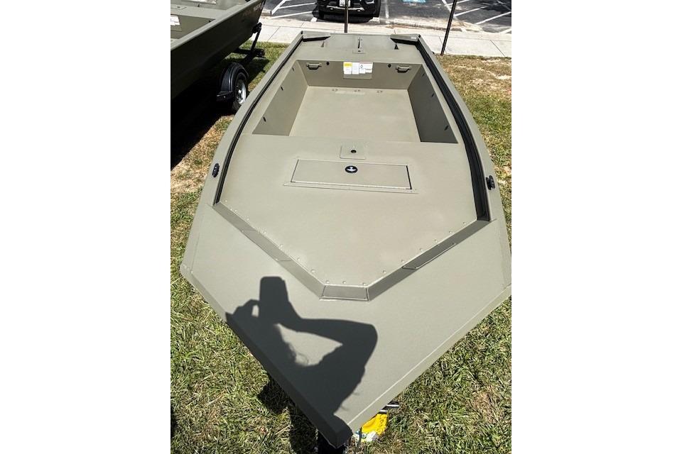Tracker Grizzly 1648 Utility 2026 Tracker Grizzly 1648 Utility boat, olive green, displayed outdoors on grass.