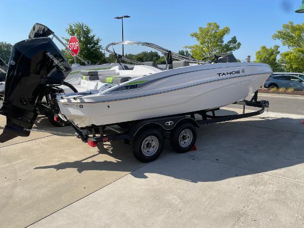 Tahoe T21 2024 Tahoe T21 boat on trailer in outdoor setting.