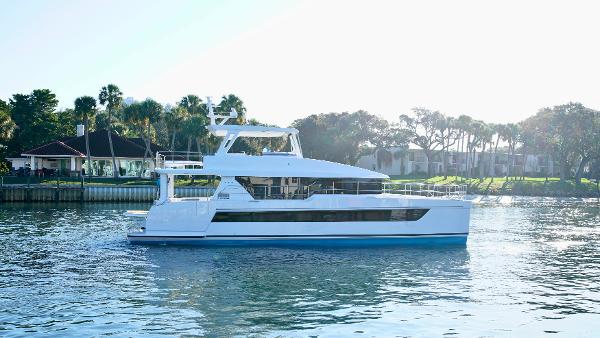 Two Oceans 555 - 008 Luxury yacht Two Oceans 555 - 008, 2025 model, cruising on a serene waterway.