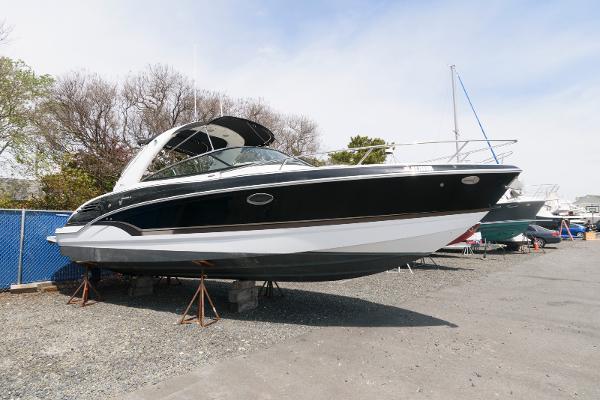 Formula 290 Sun Sport 2012 Formula 290 Sun Sport boat on stands in a boatyard.