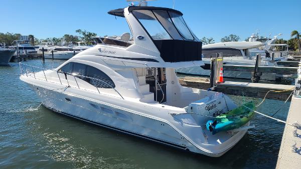Sea Ray 44 Sedan Bridge 2006 Sea Ray 44 Sedan Bridge yacht docked at marina, sunny day.