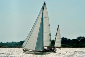 Custom Classic Yawl Sailing on a sunny day, the 2013 Custom Classic Yawl glides gracefully on shimmering waters.