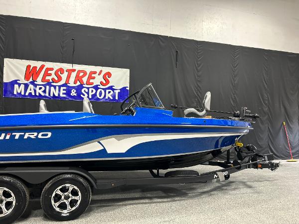 Nitro ZV20 2025 Nitro ZV20 boat in showroom, blue and white design, on trailer at Westre's Marine & Sport.