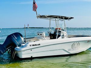 Wellcraft 202 Fisherman SCARAB 2020 Wellcraft 202 Fisherman SCARAB boat with Yamaha engine on calm water.