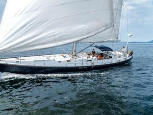 C&C 61 1974 C&C 61 sailboat cruising on open water under full sail.