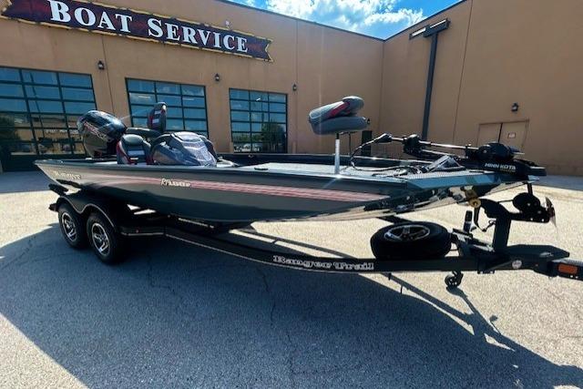Ranger RT188P 2025 Ranger RT188P boat on trailer outside a boat service center.