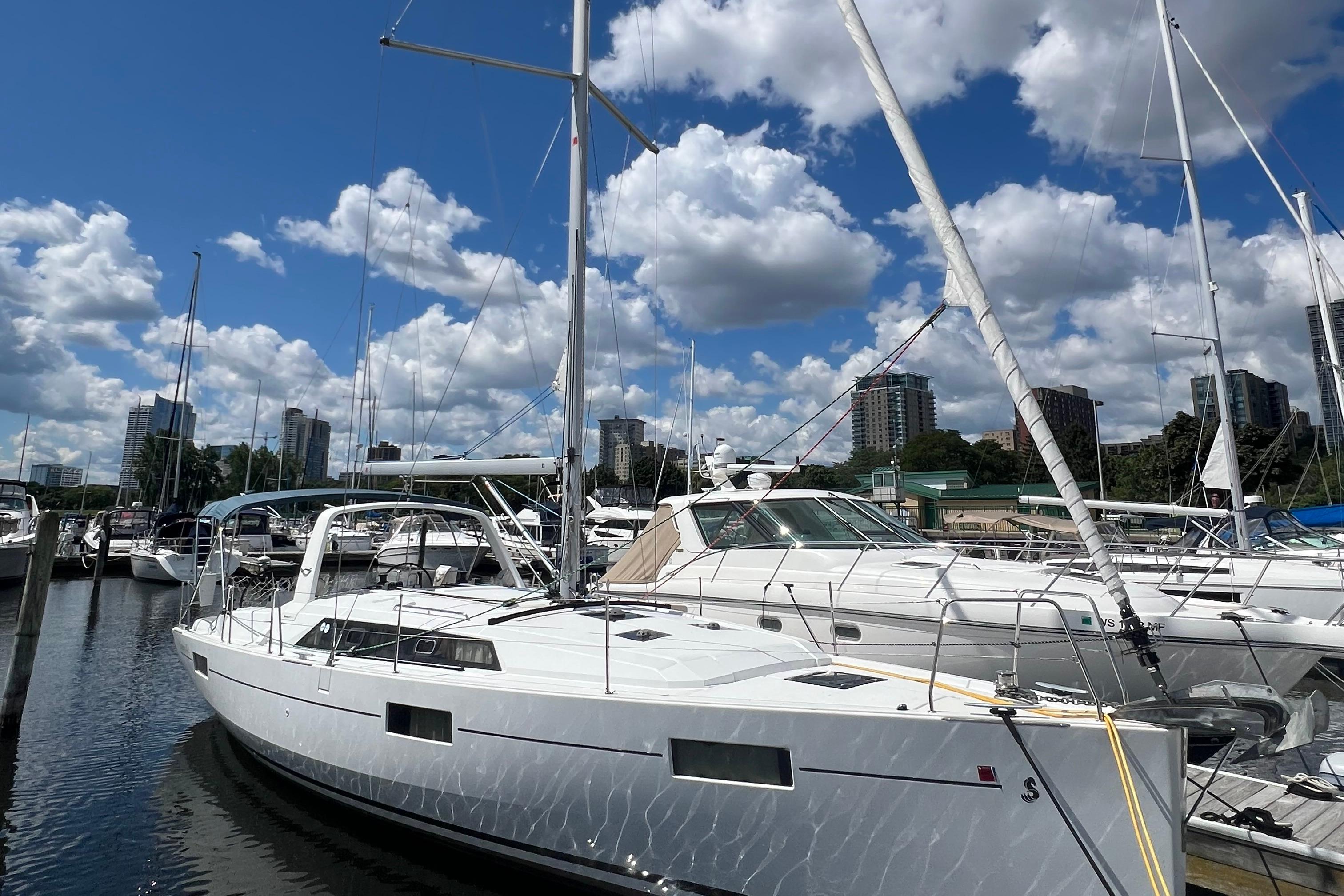 Beneteau Oceanis 41.1 2019 Beneteau Oceanis 41.1 sailboat docked in marina under blue sky.