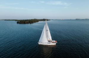 Beneteau Oceanis 54 Sailing yacht Beneteau Oceanis 54, 2010 model, cruising on open water.