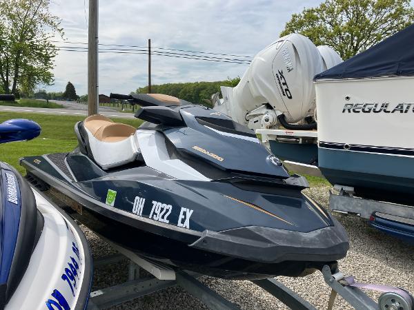 Sea-Doo GTI Limited 2012 Sea-Doo GTI Limited jet ski on trailer, parked outdoors.