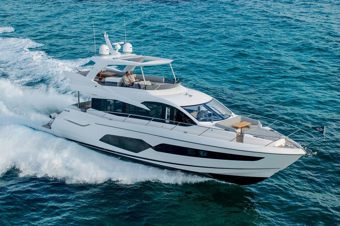 Sunseeker Manhattan 66 2018 Sunseeker Manhattan 66 yacht cruising on open sea, showcasing luxury design and performance.