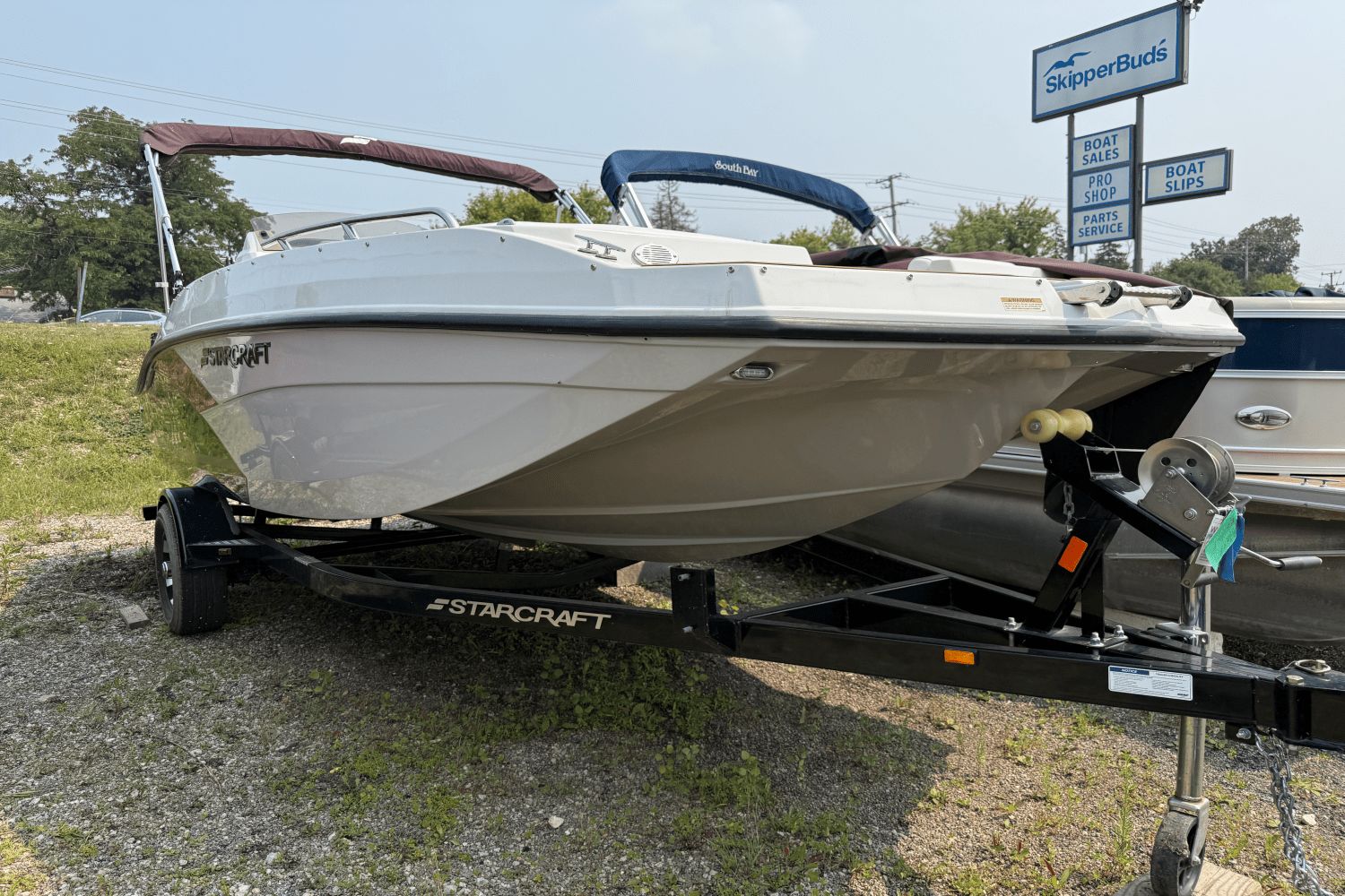 Starcraft 191 SVX OB 2022 Starcraft 191 SVX OB boat on trailer at SkipperBud's dealership.