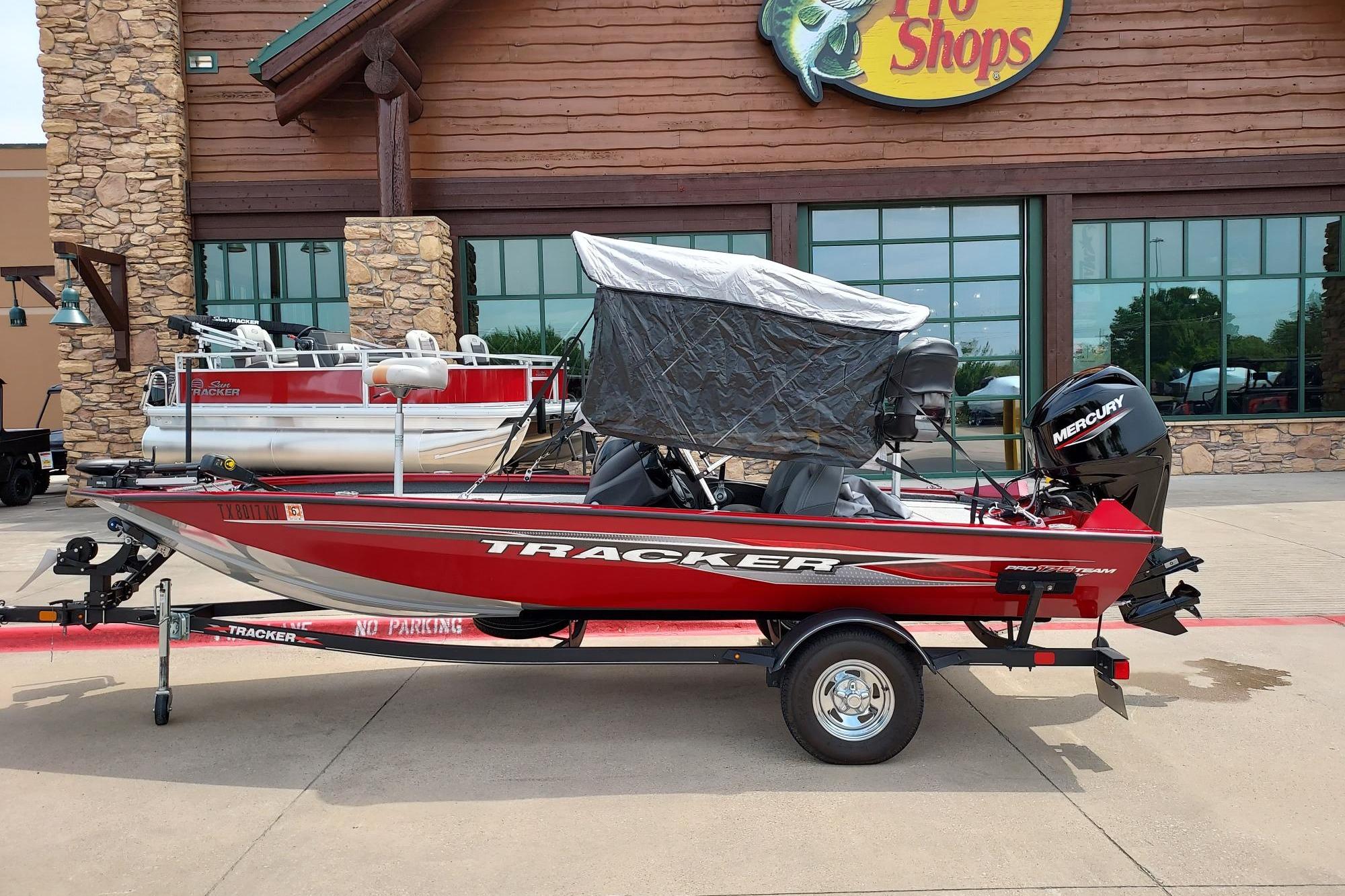 Tracker Pro Team 175 TXW 2022 Tracker Pro Team 175 TXW boat displayed outside a store.