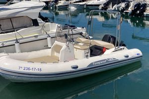 Capelli Tempest 570 2015 Capelli Tempest 570 inflatable boat docked in a marina.