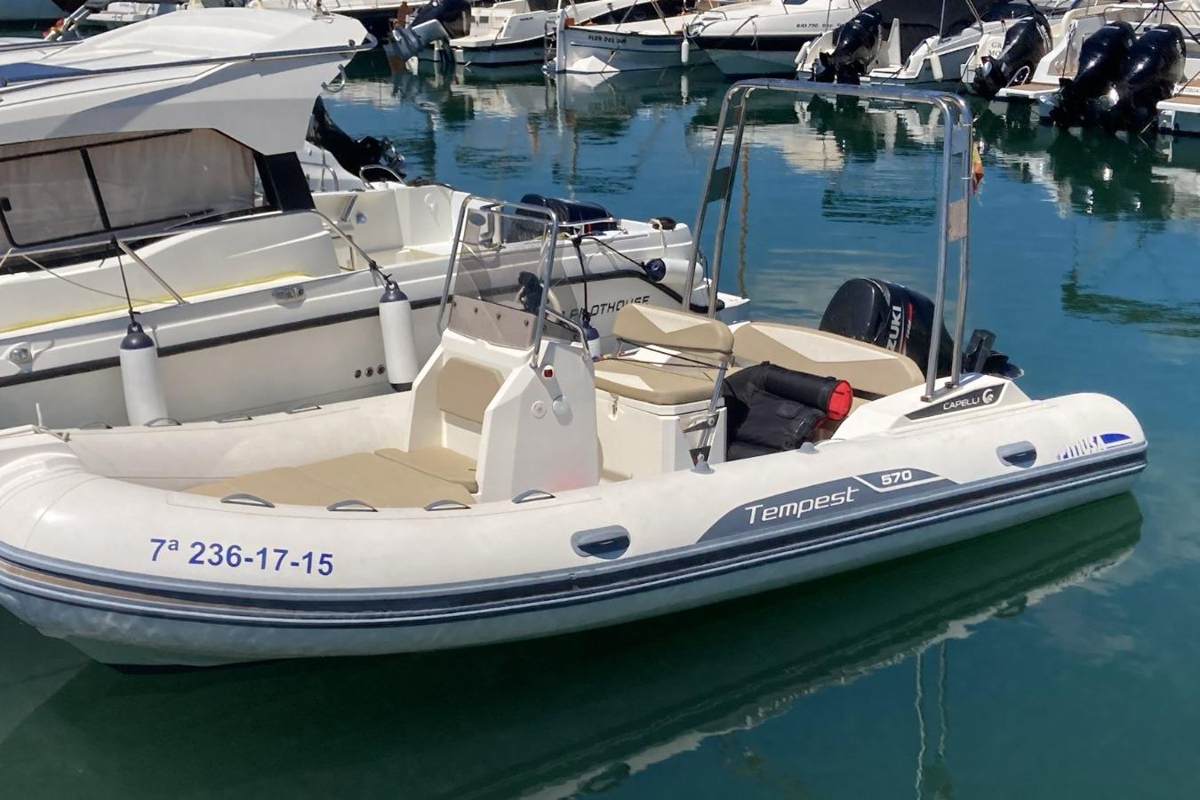 Capelli Tempest 570 2015 Capelli Tempest 570 inflatable boat docked in a marina.