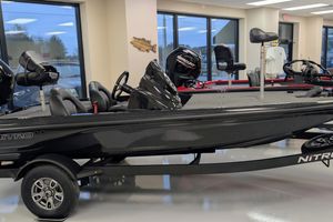 Nitro Z17 2026 Nitro Z17 boat in showroom, featuring sleek design and Mercury engine.