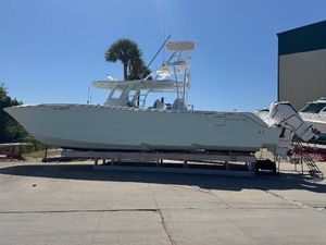 Invincible 46 Catamaran 2022 Invincible 46 Catamaran on display, side view, outdoors, clear sky.