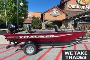 Tracker Panfish 17 2025 Tracker Panfish 17 boat displayed outside Outdoor World, with trade-in options available.