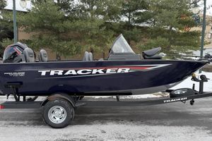 Tracker Pro Guide V-175 Combo 2026 Tracker Pro Guide V-175 Combo boat on trailer, parked outdoors.