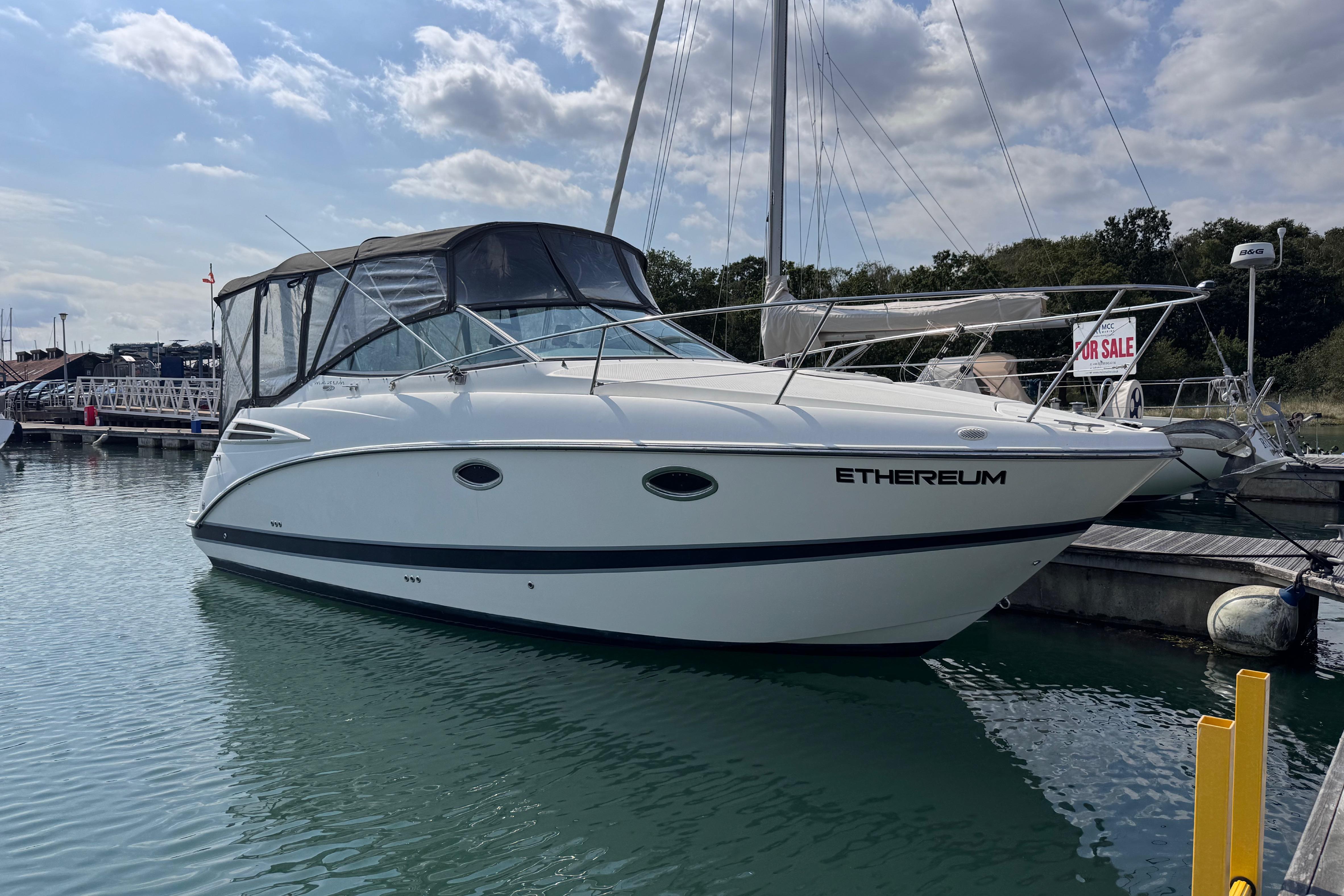 Maxum 2600 SE 2008 Maxum 2600 SE boat docked, labeled "Ethereum," with a "For Sale" sign.