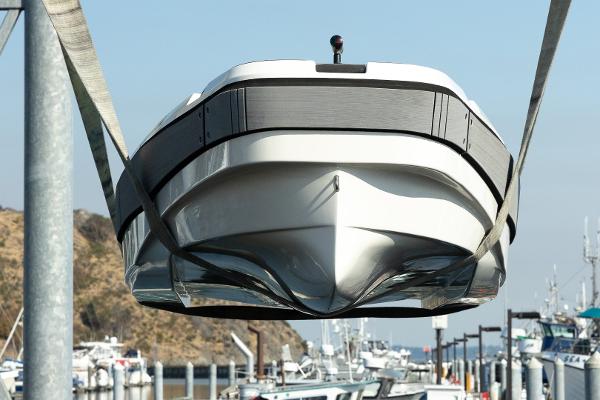 Aspen T9 Carbon Cat 2025 Aspen T9 Carbon Catamaran being lifted at a marina.