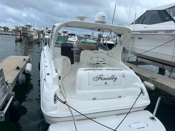 Wellcraft 3300 Martinique 2001 Wellcraft 3300 Martinique boat docked at marina, named "Finally."
