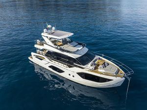 Absolute 52 FLY Luxury 2025 Absolute 52 FLY yacht on calm blue waters.