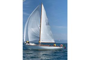 Classic Sloop Classic 1971 Carlo Sciarrelli sailboat with white sails on open water.