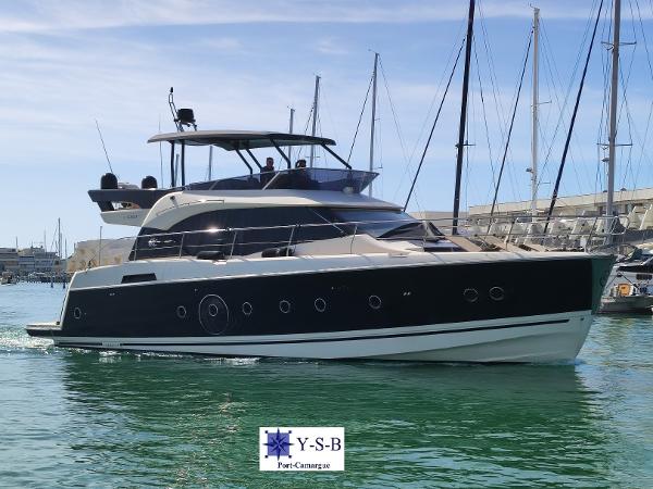 Beneteau Monte Carlo 6 2016 Beneteau Monte Carlo 6 yacht docked in a marina, clear sky, calm water.