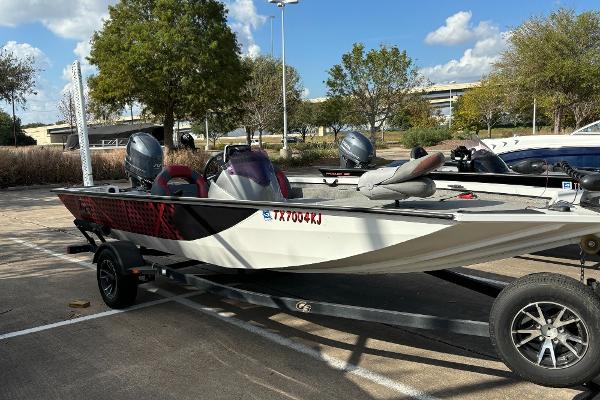 G3 Sportsman 1710 2021 G3 Sportsman 1710 boat on trailer in parking lot, sunny day.