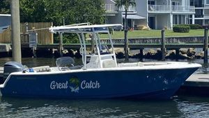Sportsman Open 232 Center Console 2022 Sportsman Open 232 Center Console boat docked, labeled "Great Catch."