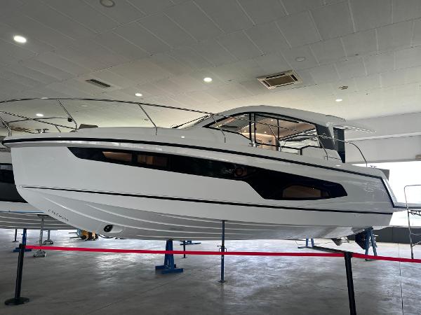 Sealine C335 2025 Sealine C335 yacht displayed indoors, showcasing sleek design and modern features.