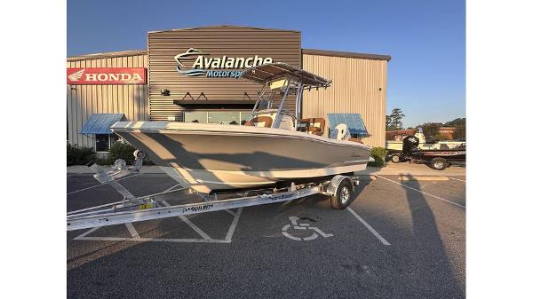 Pioneer 202 Islander 2025 Pioneer 202 Islander boat on trailer outside Avalanche Motorsports dealership.