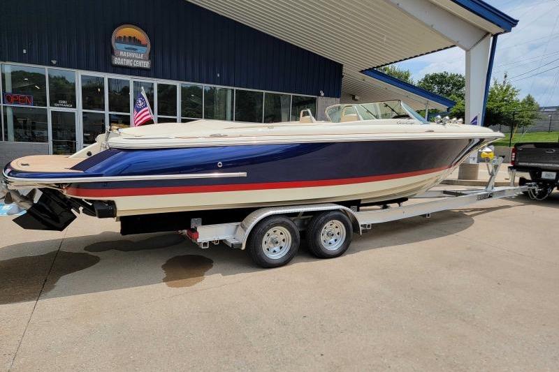 Chris-Craft Launch 27 2024 Chris-Craft Launch 27 boat on trailer at dealership.