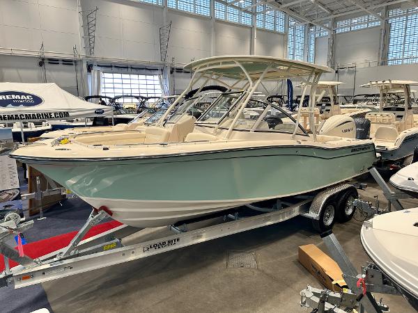 Grady-White Freedom 235 2024 Grady-White Freedom 235 boat displayed indoors on a trailer.
