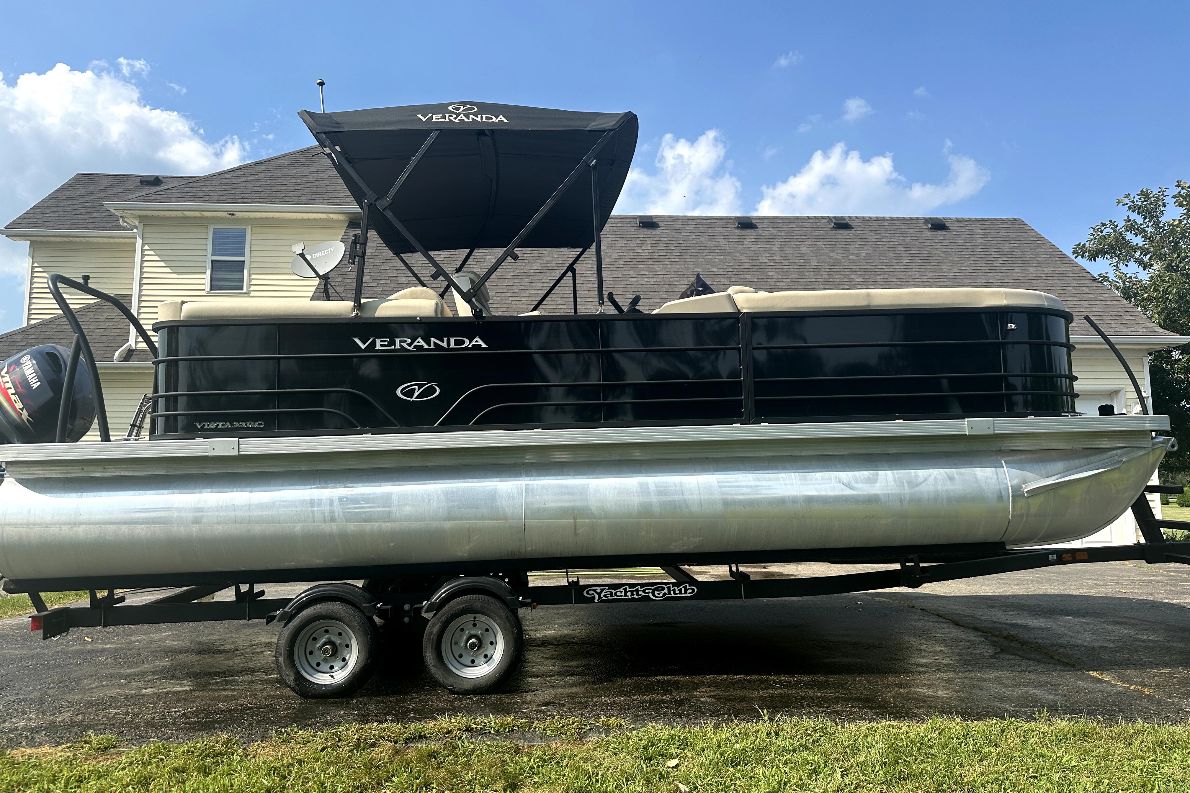 Veranda Vista 22RC 2021 Veranda Vista 22RC pontoon boat on trailer, parked in driveway.