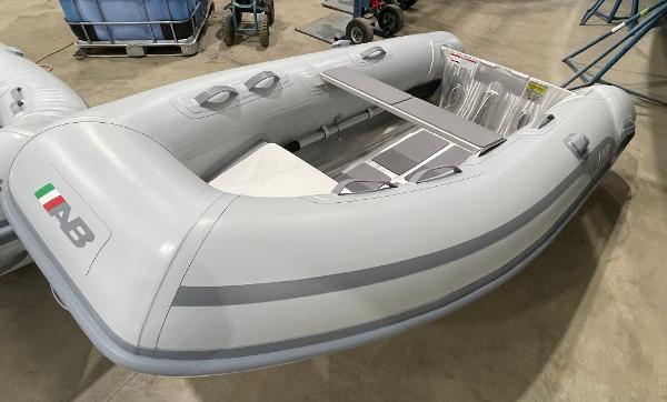 AB Inflatables Lammina 9 AL 2024 AB Inflatables Lammina 9 AL inflatable boat in a warehouse setting.