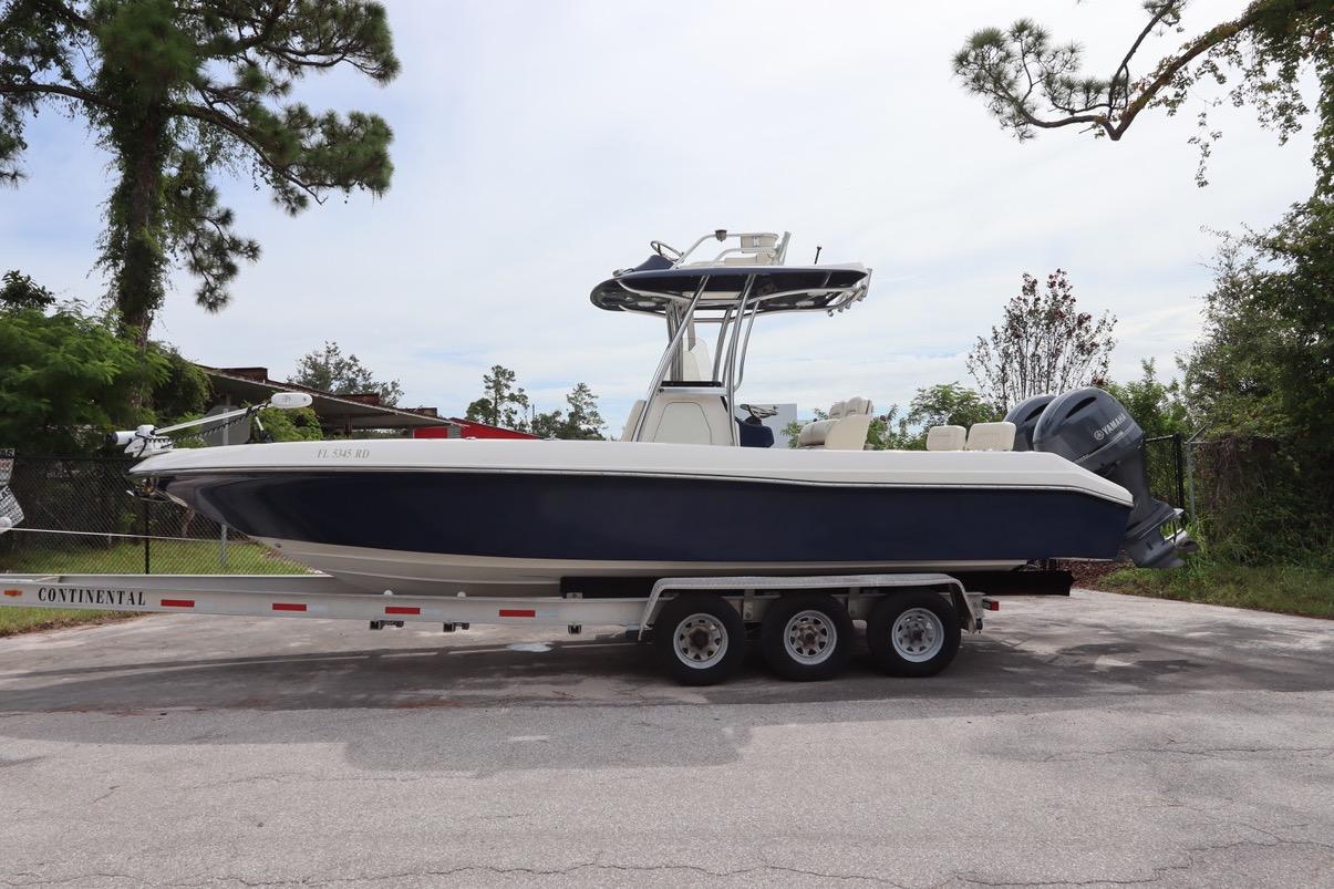 Blackwood 27 CC 2016 Blackwood 27 CC boat on trailer, parked outdoors.