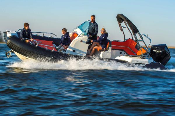 Zodiac Medline 6.8 2025 Zodiac Medline 6.8 boat cruising with passengers on open water.