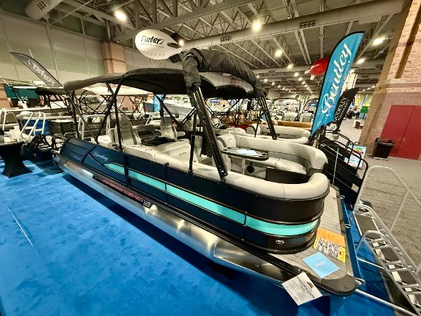 Bentley Pontoons Legacy 243 Swingback 2025 Bentley Pontoons Legacy 243 Swingback displayed at a boat show.