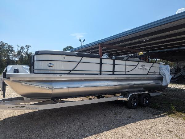 Veranda VR25RFL 2024 Veranda VR25RFL pontoon boat on a trailer under a canopy.