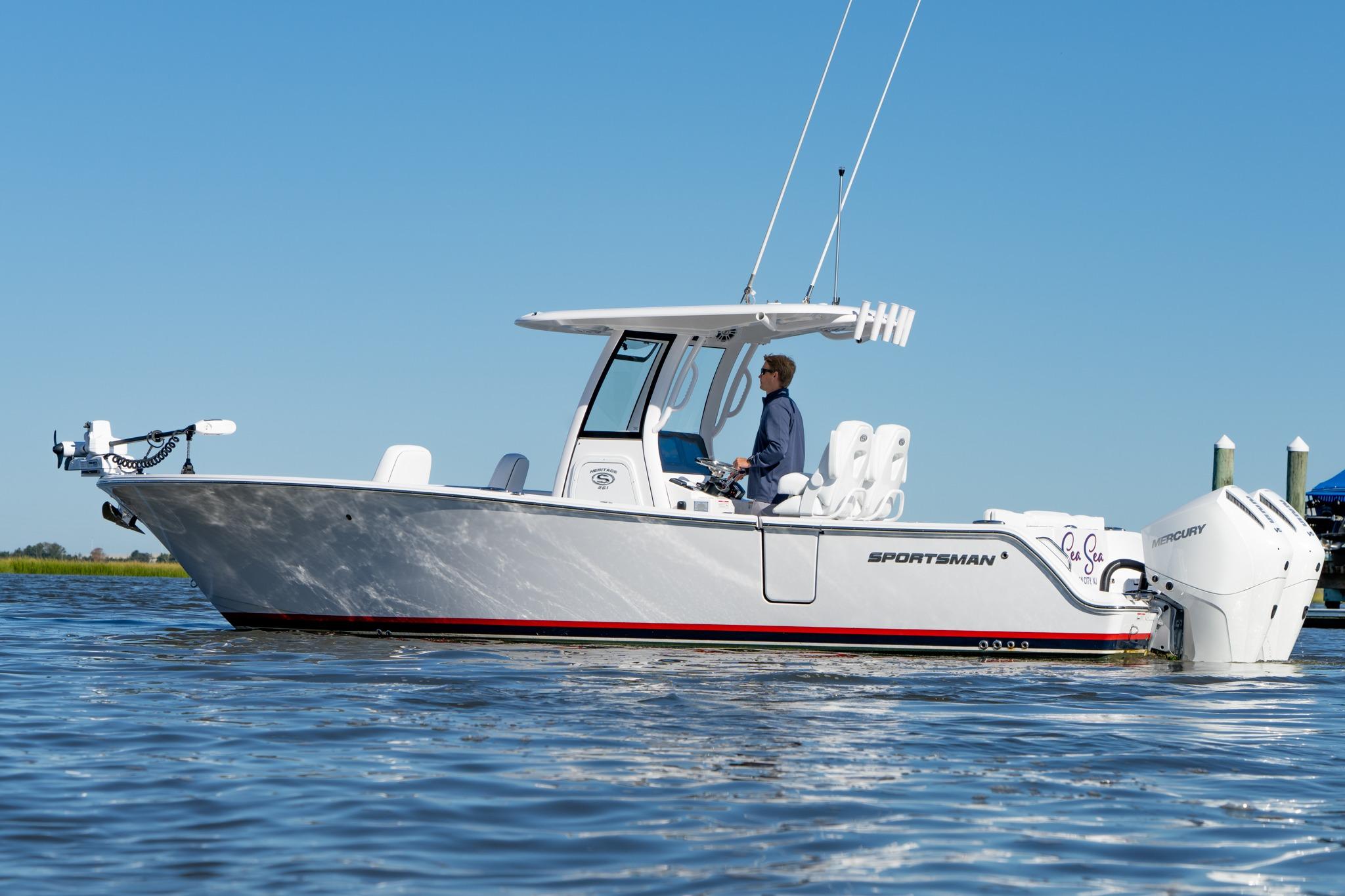 Sportsman Heritage 261 Center Console 2024 Sportsman Heritage 261 Center Console boat on calm water, side view.
