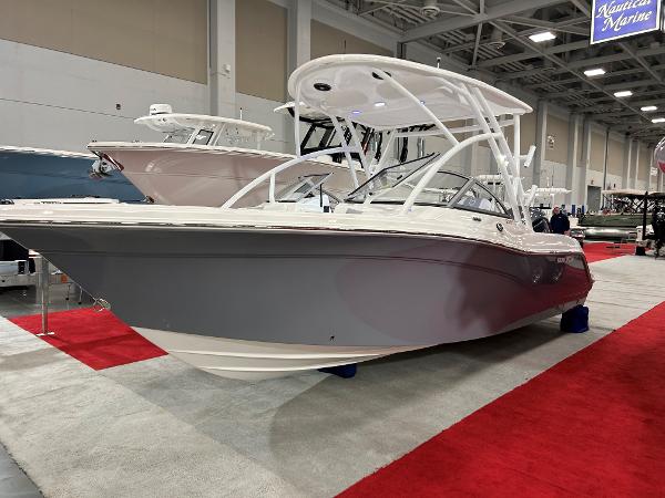 Sea Fox 228 Traveler 4.2L V6 250HP 2025 Sea Fox 228 Traveler boat displayed at an indoor exhibition.
